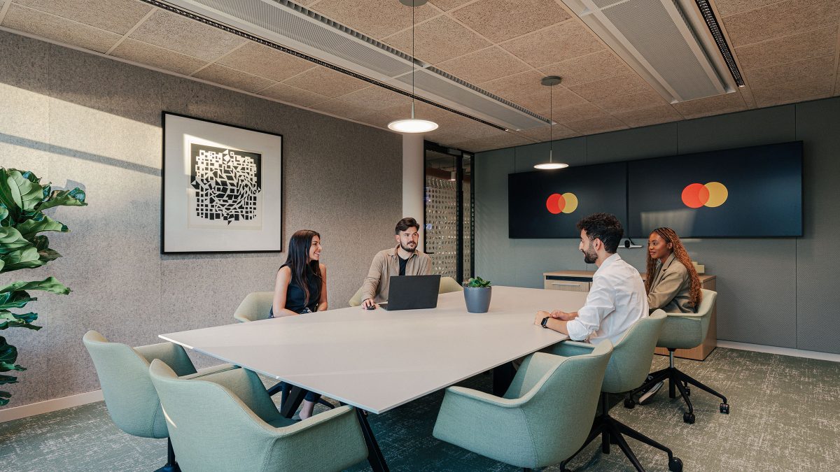 four-people-in-large-meeting-room-at-mastercard-budapest-office