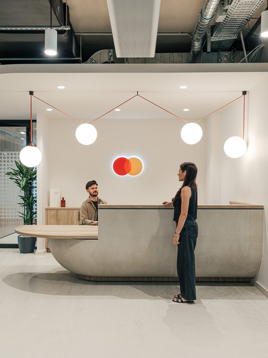 person-being-greeted-at-reception-desk-at-mastercard-budapest-office