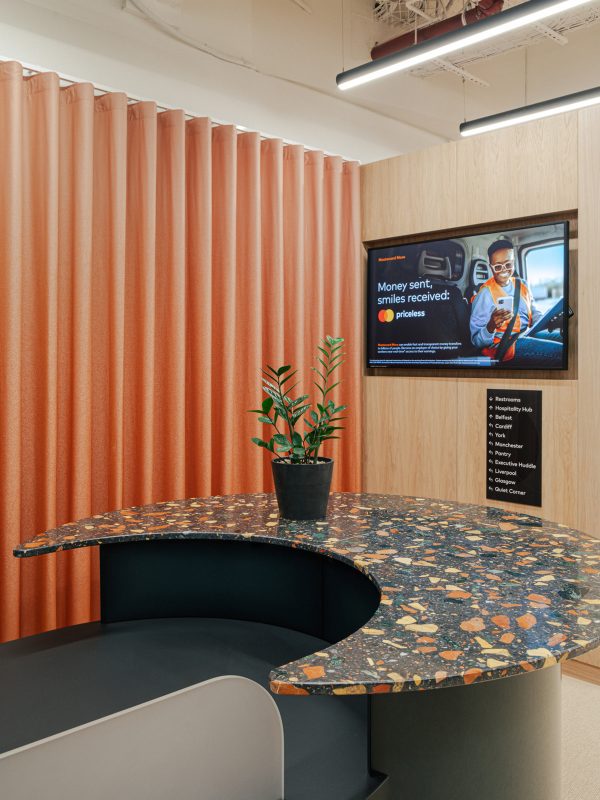 mastercard-sustainability-goals-2025-feature-reception-desk